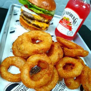 Golden beer battered onion rings and loaded fries
